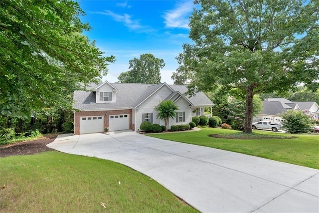17 Sassafras Trl NE, Cartersville, GA 30121 - view of front of house featuring concrete driveway, a front lawn, and an attached garage