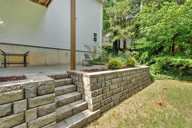 17 Sassafras Trl NE, Cartersville, GA 30121 - view of property exterior with a patio