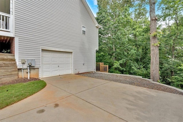17 Sassafras Trl NE, Cartersville, GA 30121 - view of property exterior with driveway and a garage