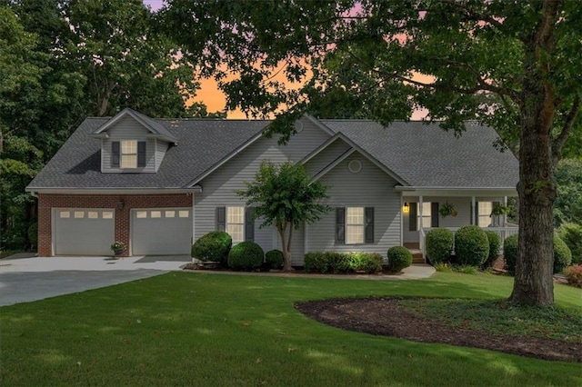 17 Sassafras Trl NE, Cartersville, GA 30121 - view of front of home featuring a garage, concrete driveway, a yard, a porch, and a shingled roof
