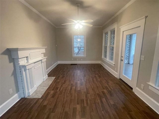 interior space with ornamental molding, dark hardwood / wood-style floors, and ceiling fan