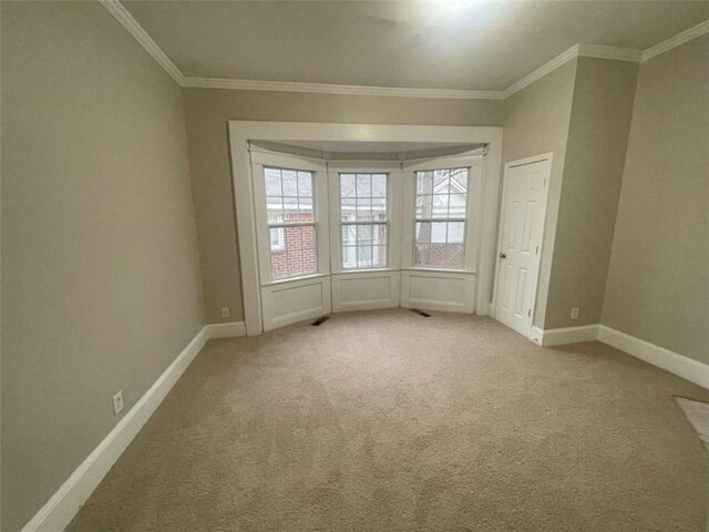 corridor featuring light colored carpet