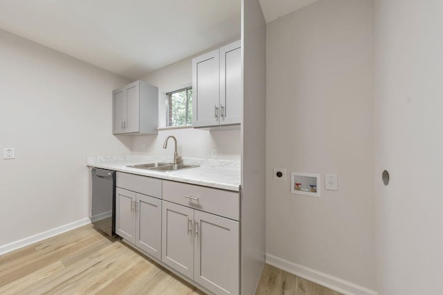 1111 Clairemont Ave Unit N3, Decatur, GA 30030 - washroom with washer hookup, electric dryer hookup, light wood-type flooring, and baseboards
