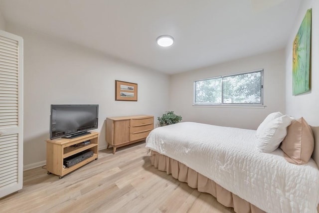 1111 Clairemont Ave Unit N3, Decatur, GA 30030 - bedroom featuring light wood finished floors and baseboards