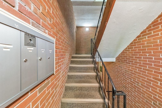 1111 Clairemont Ave Unit N3, Decatur, GA 30030 - staircase featuring brick wall