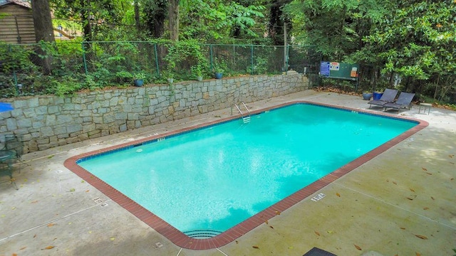 1111 Clairemont Ave Unit N3, Decatur, GA 30030 - community pool with a fenced backyard and a patio area