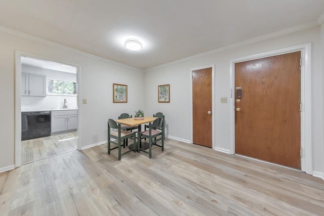1111 Clairemont Ave Unit N3, Decatur, GA 30030 - dining area with light wood finished floors, crown molding, and baseboards