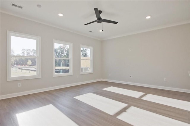 101 Priestwood Ln, Acworth, GA 30102 - empty room featuring crown molding, wood finished floors, a ceiling fan, baseboards, and recessed lighting