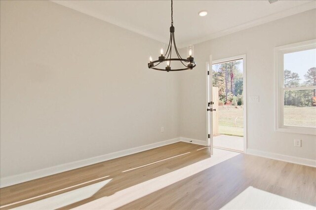 101 Priestwood Ln, Acworth, GA 30102 - unfurnished dining area featuring a chandelier, wood finished floors, plenty of natural light, baseboards, and recessed lighting