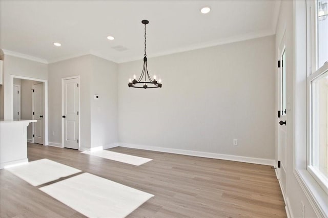 101 Priestwood Ln, Acworth, GA 30102 - unfurnished dining area featuring crown molding, a chandelier, light wood-style flooring, baseboards, and recessed lighting