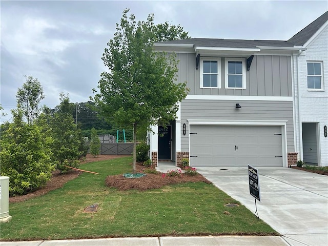 101 Priestwood Ln, Acworth, GA 30102 - view of front facade featuring board and batten siding, brick siding, a garage, and driveway