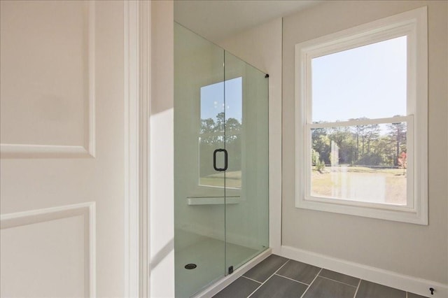 101 Priestwood Ln, Acworth, GA 30102 - bathroom with a stall shower, baseboards, and tile patterned flooring
