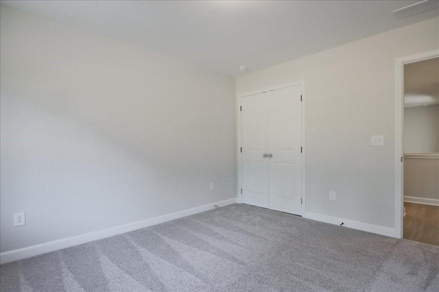 101 Priestwood Ln, Acworth, GA 30102 - unfurnished bedroom featuring carpet floors, baseboards, and a closet