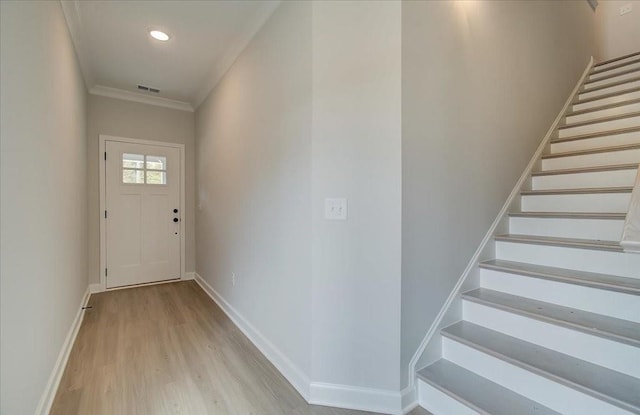 101 Priestwood Ln, Acworth, GA 30102 - doorway with stairway, light wood finished floors, baseboards, ornamental molding, and recessed lighting