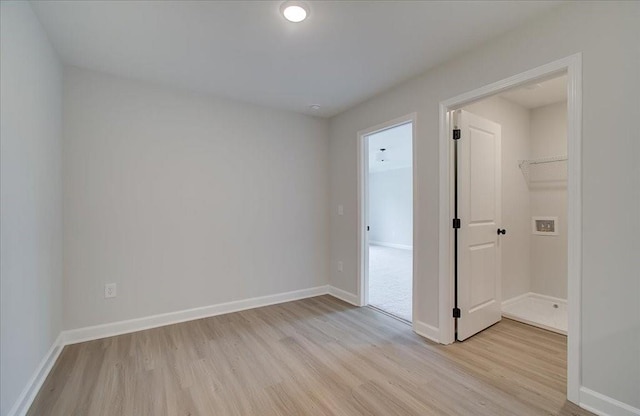 101 Priestwood Ln, Acworth, GA 30102 - spare room featuring light wood-type flooring and baseboards