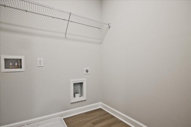 101 Priestwood Ln, Acworth, GA 30102 - clothes washing area featuring hookup for an electric dryer, hookup for a washing machine, baseboards, and dark wood-style floors