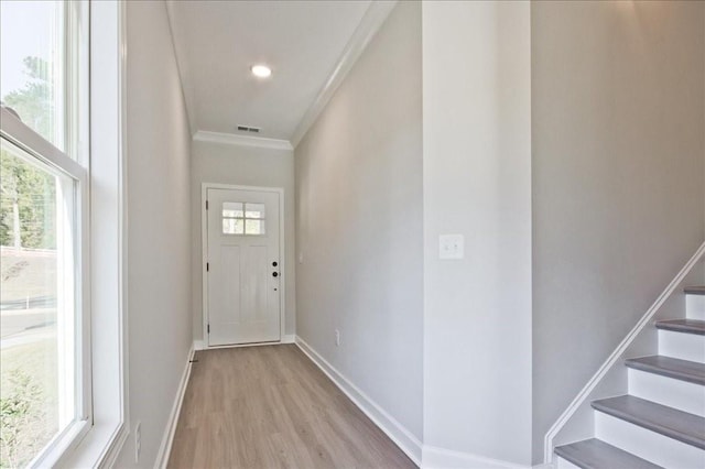 101 Priestwood Ln, Acworth, GA 30102 - doorway featuring ornamental molding, light wood-style floors, stairway, baseboards, and recessed lighting