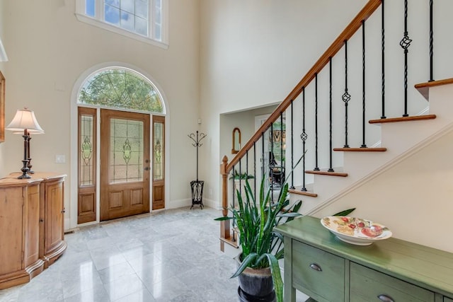 5359 Point S Dr, Gainesville, GA 30504 - entryway with plenty of natural light, a towering ceiling, and stairs