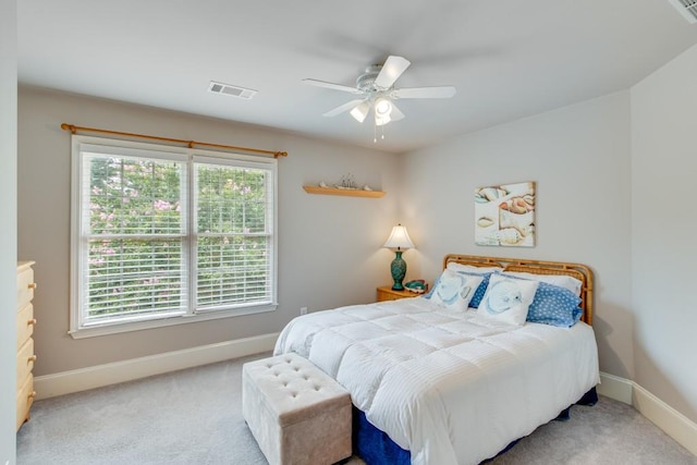 5359 Point S Dr, Gainesville, GA 30504 - carpeted bedroom featuring multiple windows and ceiling fan