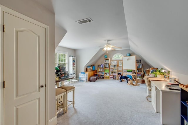 5359 Point S Dr, Gainesville, GA 30504 - recreation room featuring healthy amount of natural light, vaulted ceiling, light carpet, and a ceiling fan