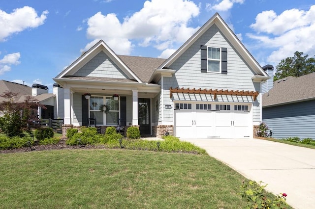 80 Azalea Xing, Dallas, GA 30132 - craftsman house featuring a porch, a front lawn, concrete driveway, an attached garage, and brick siding