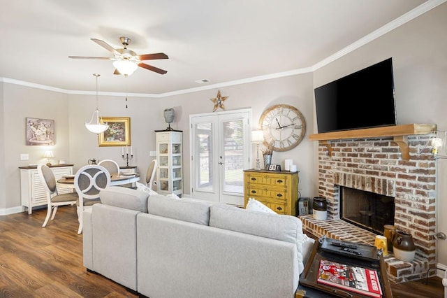 80 Azalea Xing, Dallas, GA 30132 - living room featuring wood finished floors, ceiling fan, crown molding, a fireplace, and baseboards
