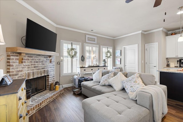 80 Azalea Xing, Dallas, GA 30132 - living room featuring ceiling fan, dark wood-style flooring, baseboards, a fireplace, and crown molding