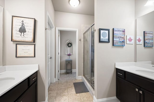 80 Azalea Xing, Dallas, GA 30132 - bathroom featuring two vanities, a shower stall, and tile patterned flooring