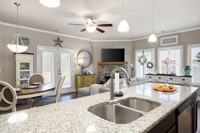 80 Azalea Xing, Dallas, GA 30132 - kitchen with a sink, ceiling fan, decorative light fixtures, stainless steel dishwasher, and wood finished floors