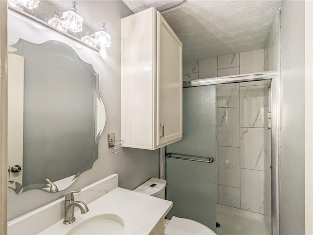 1312 La Mesa Dr, Lawrenceville, GA 30043 - full bath featuring a shower stall, a textured ceiling, toilet, and vanity