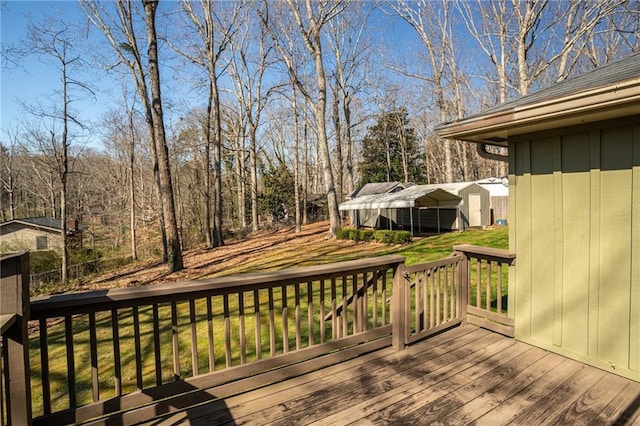 1312 La Mesa Dr, Lawrenceville, GA 30043 - deck featuring a yard, an outdoor structure, and view of scattered trees