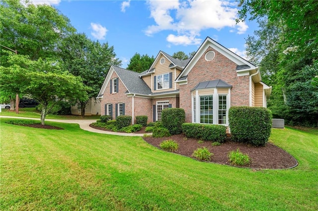 1995 Settindown Dr, Roswell, GA 30075 - traditional-style house featuring brick siding and a front lawn