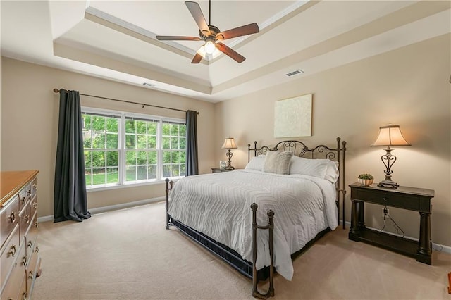 1995 Settindown Dr, Roswell, GA 30075 - bedroom with a raised ceiling, light colored carpet, and ceiling fan