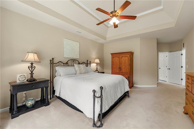 1995 Settindown Dr, Roswell, GA 30075 - bedroom featuring a tray ceiling, light colored carpet, and a ceiling fan