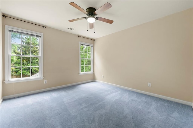 1995 Settindown Dr, Roswell, GA 30075 - empty room featuring carpet flooring and ceiling fan