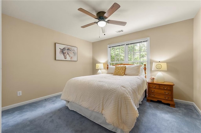 1995 Settindown Dr, Roswell, GA 30075 - carpeted bedroom with baseboards and ceiling fan
