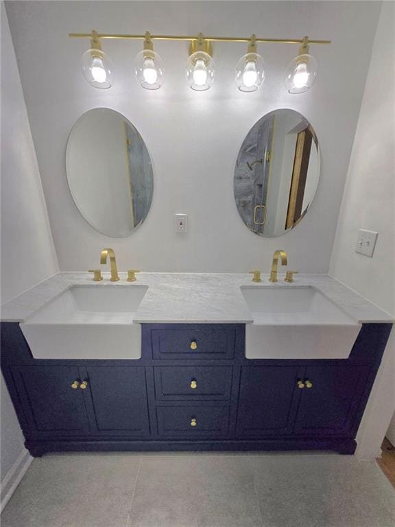 bathroom with double vanity and a sink