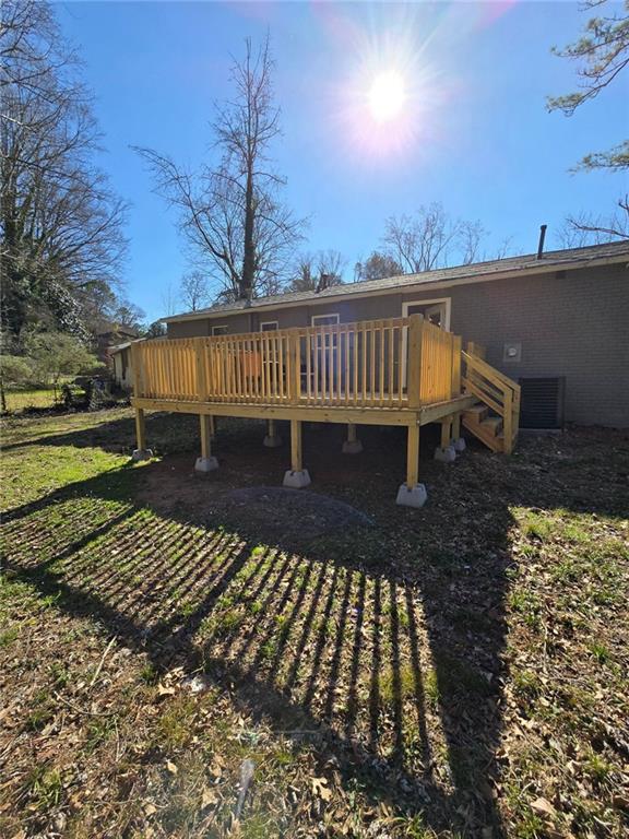 deck featuring a yard