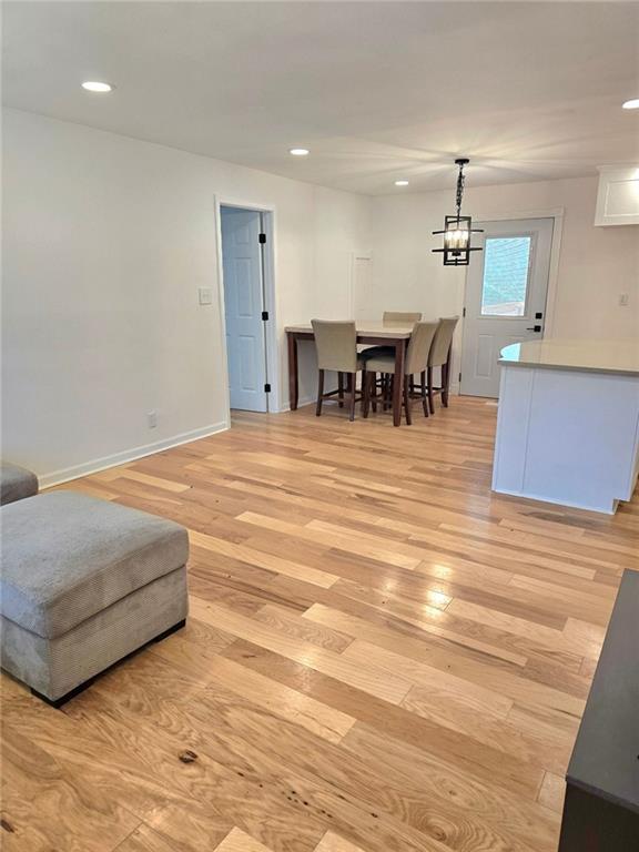 interior space featuring recessed lighting and light wood-style flooring