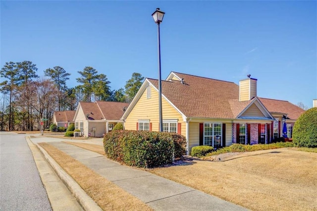 view of front of property with a chimney