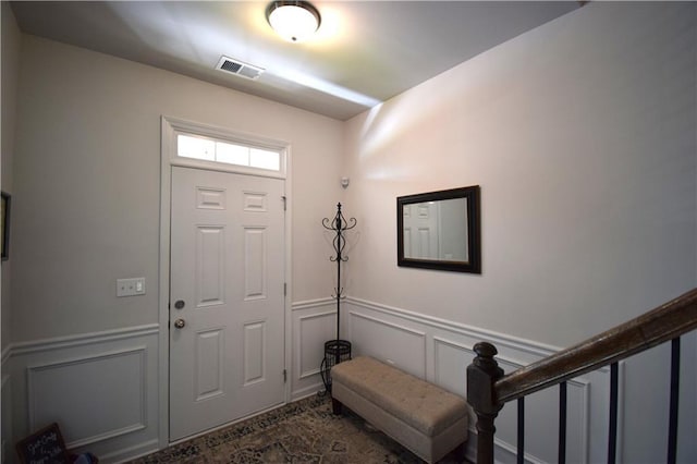 485 Broadmoor Dr, Braselton, GA 30517 - entrance foyer featuring a decorative wall and a wainscoted wall