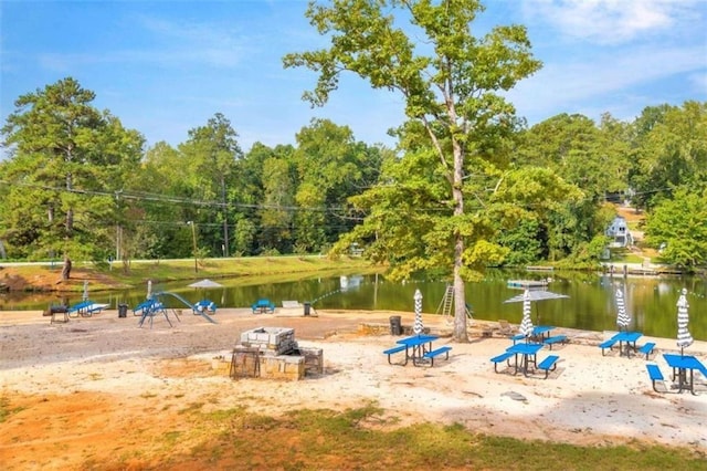 view of community with a water view