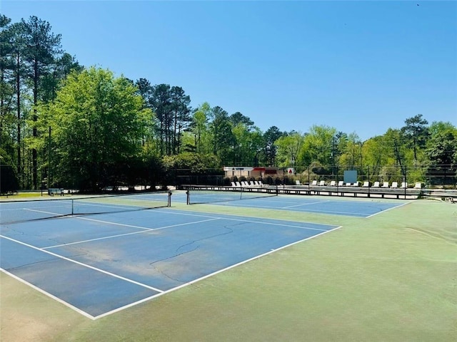 view of sport court with fence