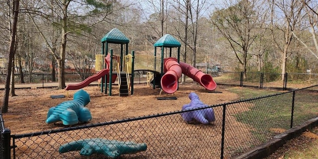 community jungle gym with fence