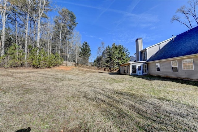 view of yard featuring fence