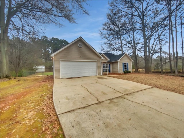 view of front facade with driveway and an attached garage