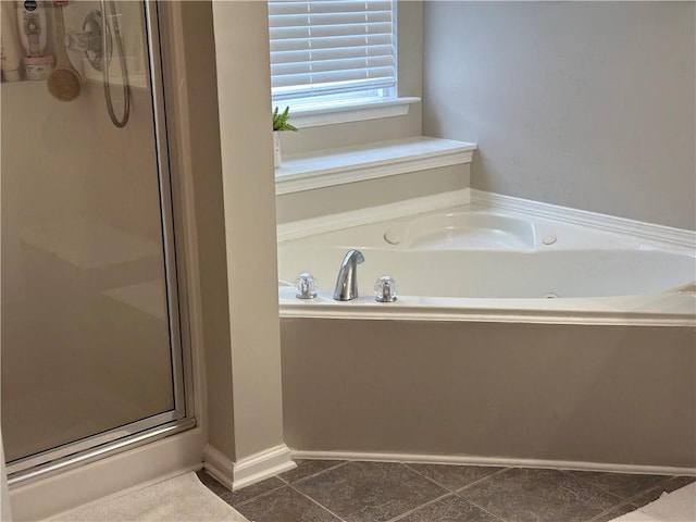 full bathroom with a garden tub and an enclosed shower