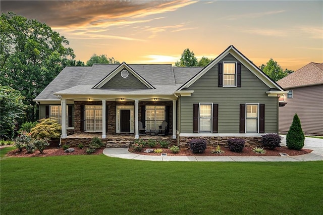 craftsman house with a lawn