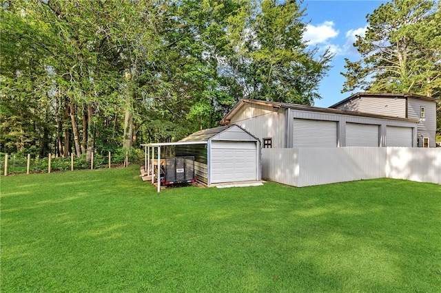288 Valerie Cir, Hiram, GA 30141 - view of yard featuring a detached garage, an outbuilding, and driveway