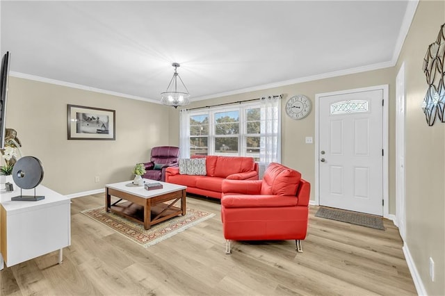 288 Valerie Cir, Hiram, GA 30141 - living area featuring light wood-type flooring, a chandelier, and ornamental molding